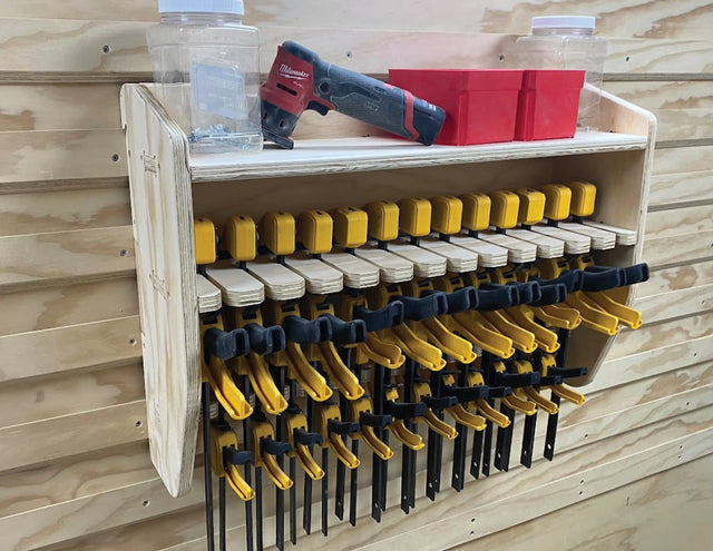 French Cleat Trigger Clamp storage rack cabinet designed to hold large woodworking clamps and small trigger clamps made from plywood using CNC router files on a cnc router machine